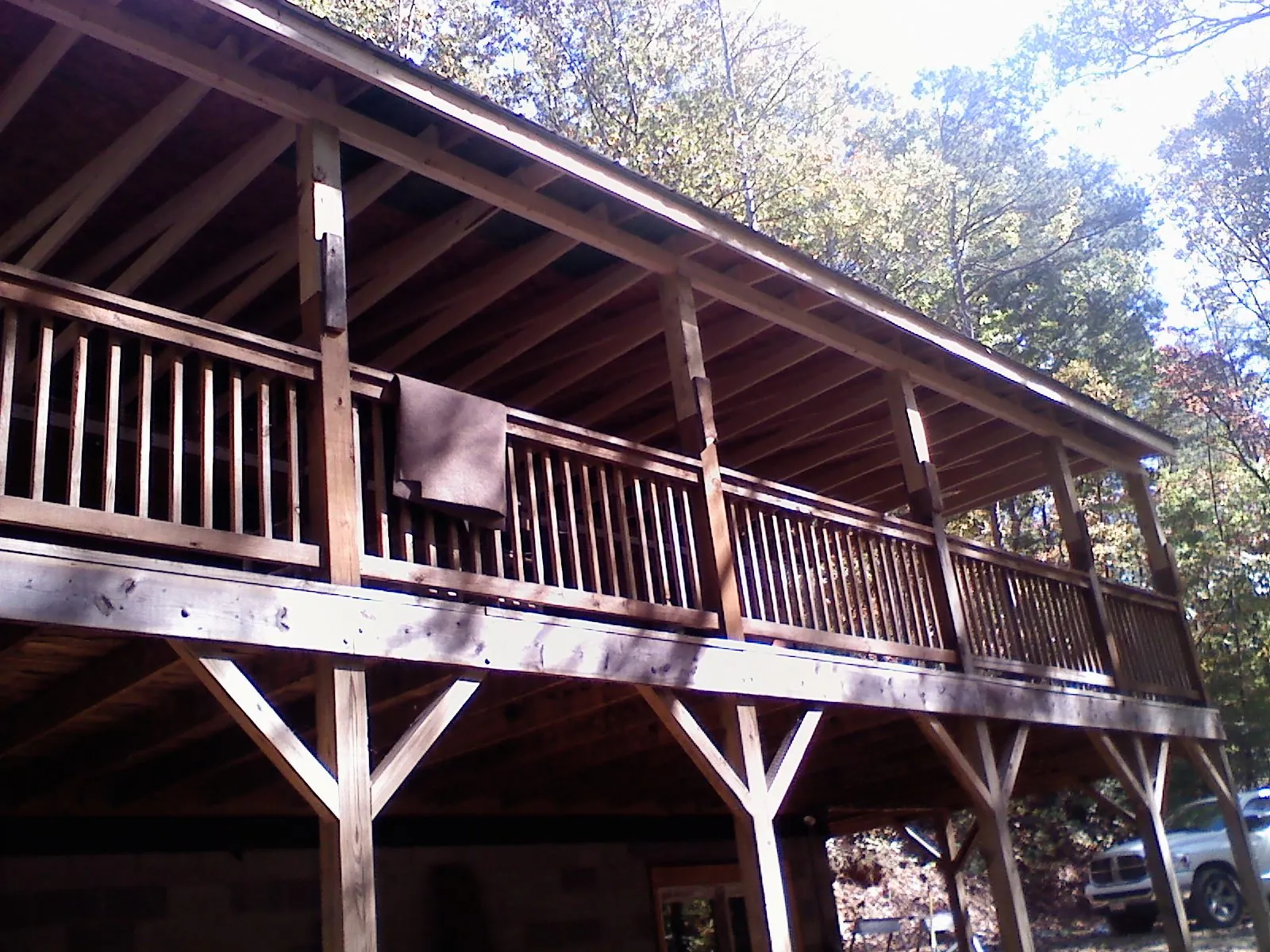Timber framing under a new elevated porch and deck — Roof Leak Repair in Holmesville by Roofing Brothers